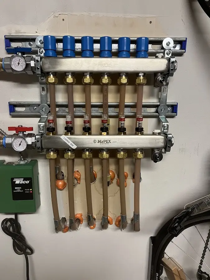 Plumber performing Water Heater Repair at a residential property in Fox Crossing